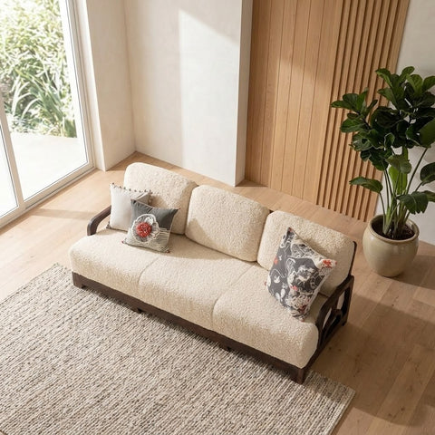 1. PRITI handcrafted wooden sofa with neutral cream fabric for modern home interiors