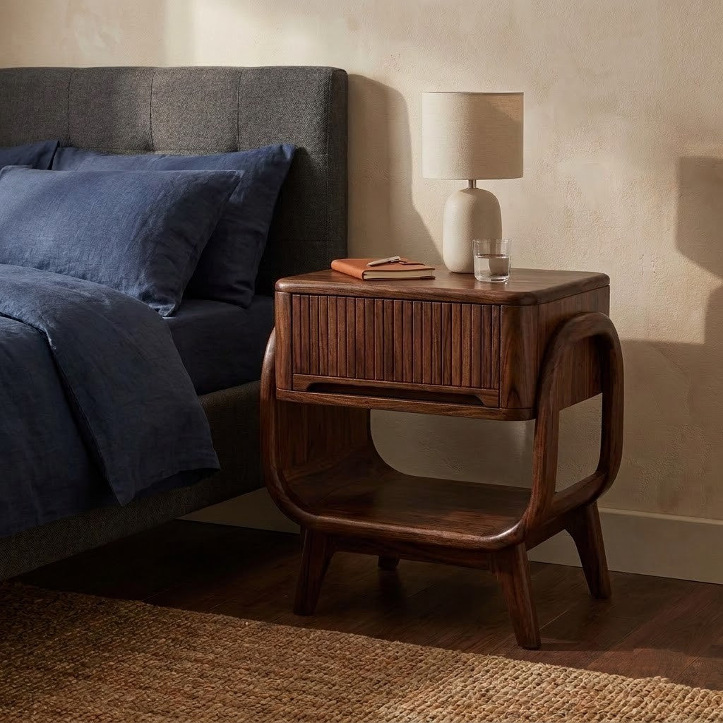 Dark Walnut Sheesham bedside table beside modern bed