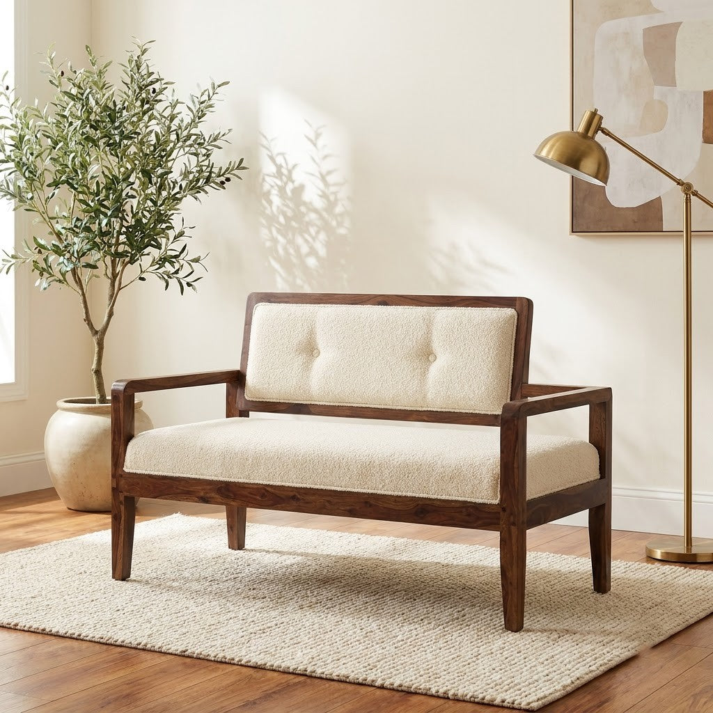Dark walnut Sheesham wood bench with crème boucle upholstery for bedroom
