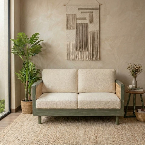 Mango wood living room sofa with cane side panels and boucle fabric