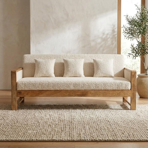 Mango wood living room sofa with natural finish and neutral upholstery