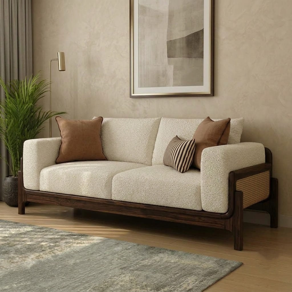 Modern Sheesham wood 3 seater sofa with curved design and cane detailing