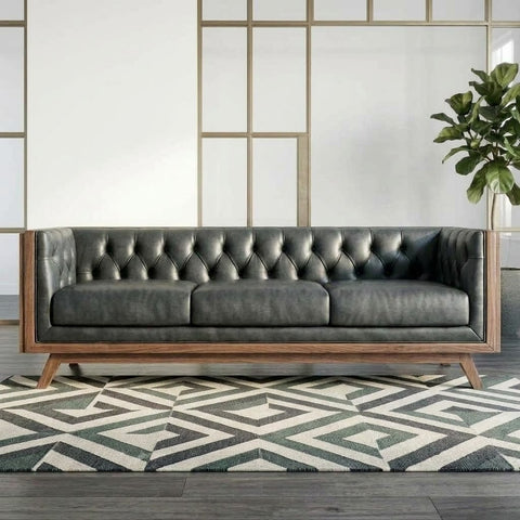 Modern wooden sofa with natural cane panels and tufted black backrest
