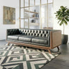 PRITI 3 seater teak wood sofa with black leather upholstery and cane sides