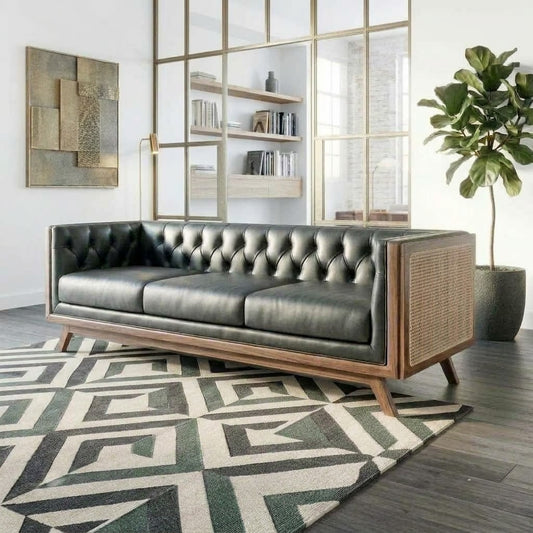 PRITI 3 seater teak wood sofa with black leather upholstery and cane sides