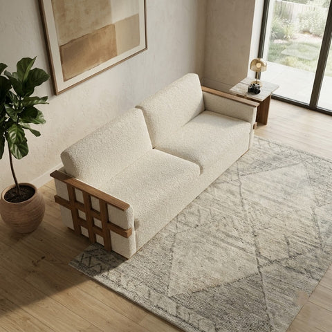 PRITI handcrafted wooden sofa in dark walnut finish with plush cream fabric