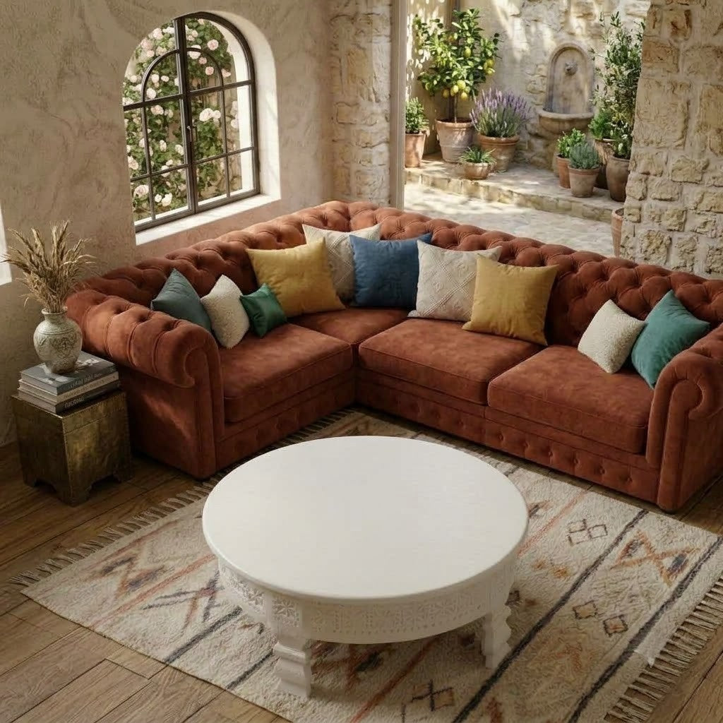 PRITI round wooden coffee table with fluted legs and carving