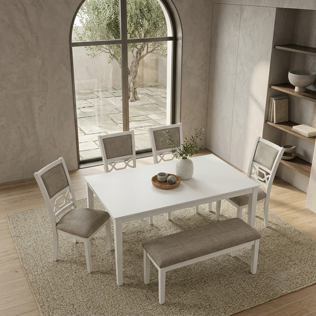Rectangular white dining table with four fabric chairs and matching bench