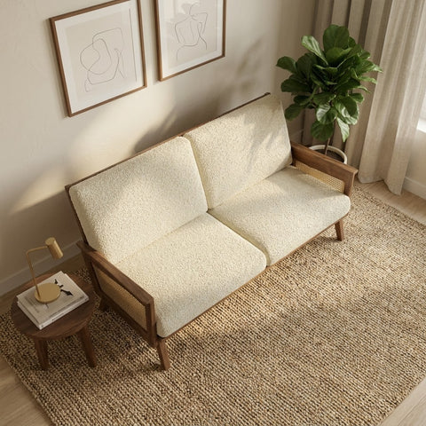 Slim line two seater sofa with wooden frame and upholstered seats