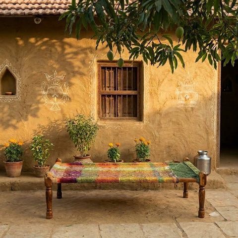 Traditional Indian charpai made with sheesham wood and colourful rope