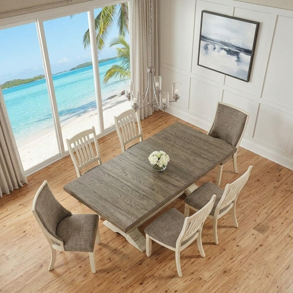 White extension dining table with twelve matching chairs